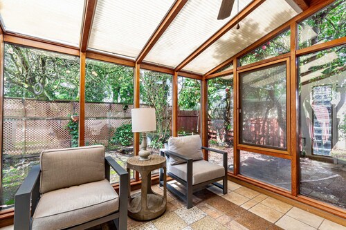 Spacious Mid Century Modern Sunroom Rambler with Portable AC