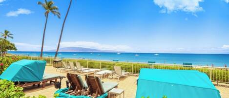 Private beach access with oceanfront loungers, luxury cabanas, panoramic ocean views, crystal waters & tropical resort gardens