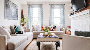 Chambre simple Confort | Aire de séjour