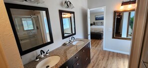 Hair dryer, towels, shampoo, toilet paper