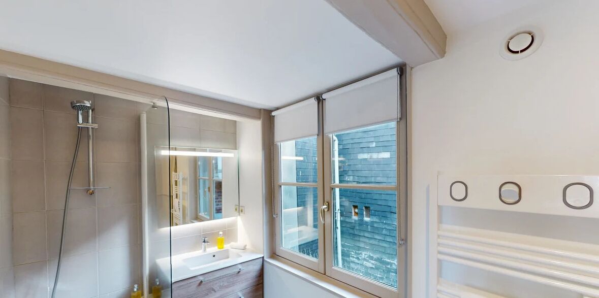 Bathtub, hair dryer, towels, soap
