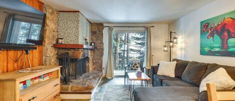 TV, fireplace, books, offices
