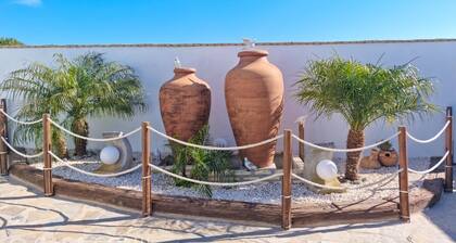 luxurious villa in quiet surrounding for 6 guests with large pool and precious terraces and nice bbq-area and seaview in the distance