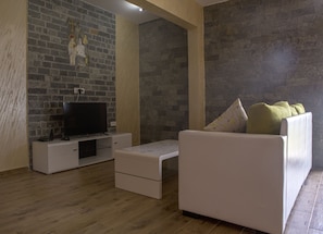 Deluxe appartement | Woonruimte