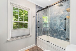 Shower, hair dryer, towels, soap