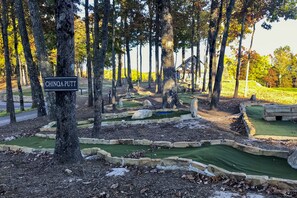 Play a round of golf at CHINOA-PUTT, a scenic outdoor course with putting greens surrounded by natural borders.