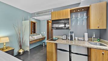 Coffee/tea maker, cleaning supplies, paper towels