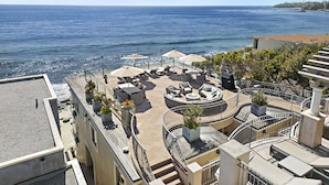A rooftop terrace with outdoor seating, a pool, and a view of the sea. - 6 Ocean views, direct beach access Sunset Cove Laguna BCH (F) (Laguna Beach)