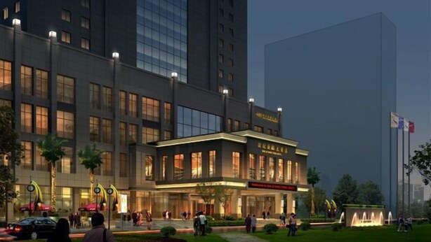 A modern hotel with a large entrance, well-lit facade, and a landscaped garden area. - Century Haoting Hotel (Yiyang)