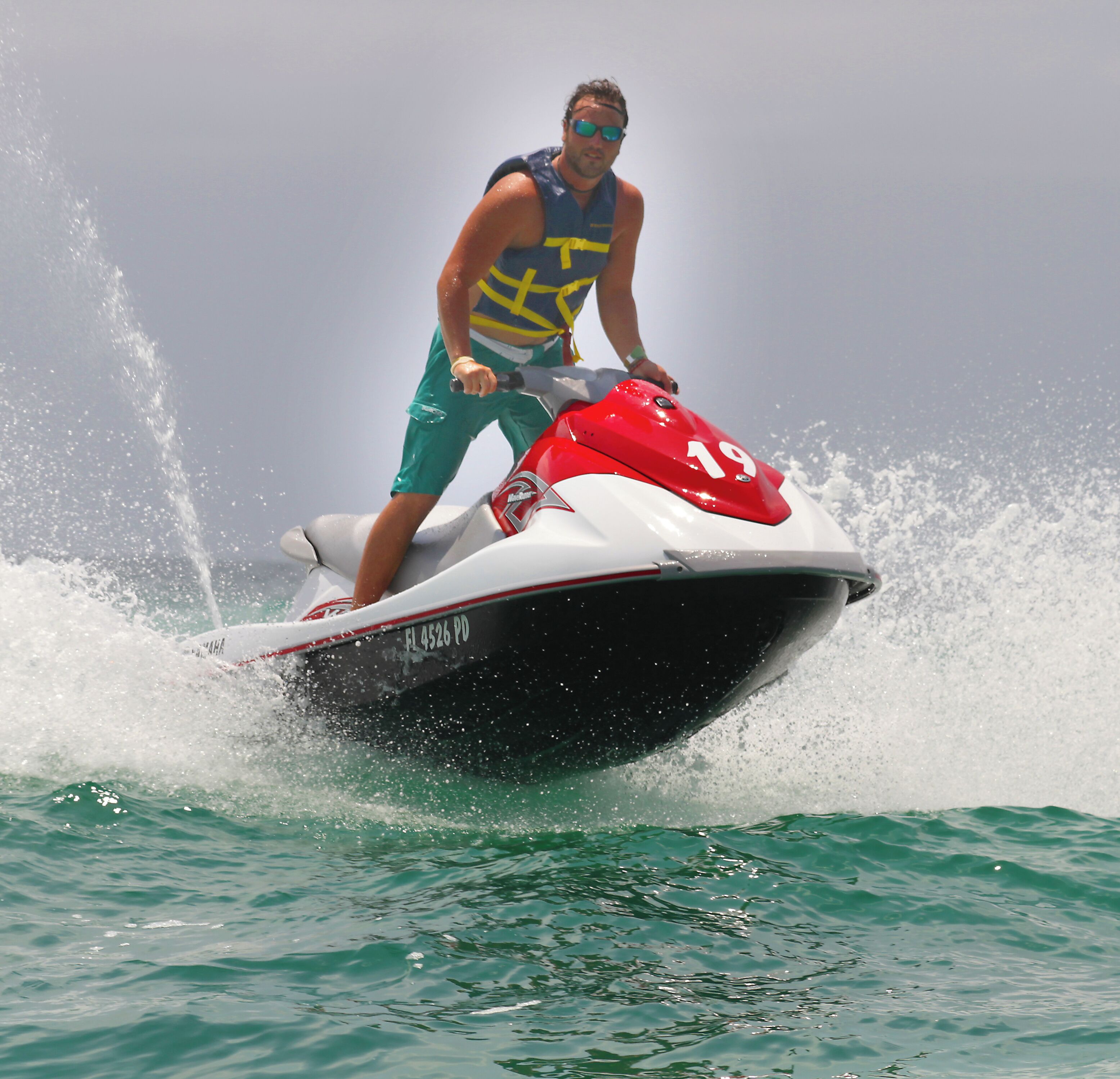 A person riding a jet ski on water.