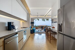 Fridge, microwave, oven, stovetop - Experience Luxury at Casa Daniel: 6th Floor Retreat with the Largest Rooftop Pool in Central America, Elite Gym, and Just 7 Minutes to the Beach! (Puerto Vallarta)