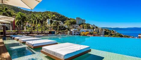 A rooftop pool, a heated pool