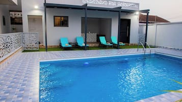 Outdoor pool, open 6:00 AM to 6:00 PM, lifeguards on site