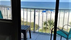 A balcony with a view of the beach and ocean. - Ambassador #224 w/Amazing Beach Front View ~ Pool ~ Hot Tub ~ Pier Park~ Pets Ok (Panama City Beach)