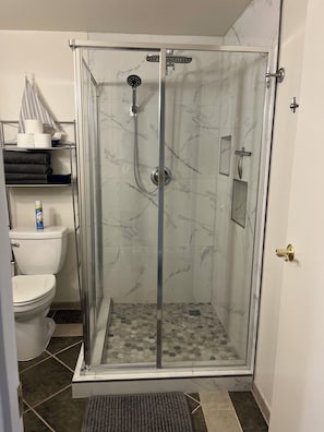 Hair dryer, towels, soap, shampoo