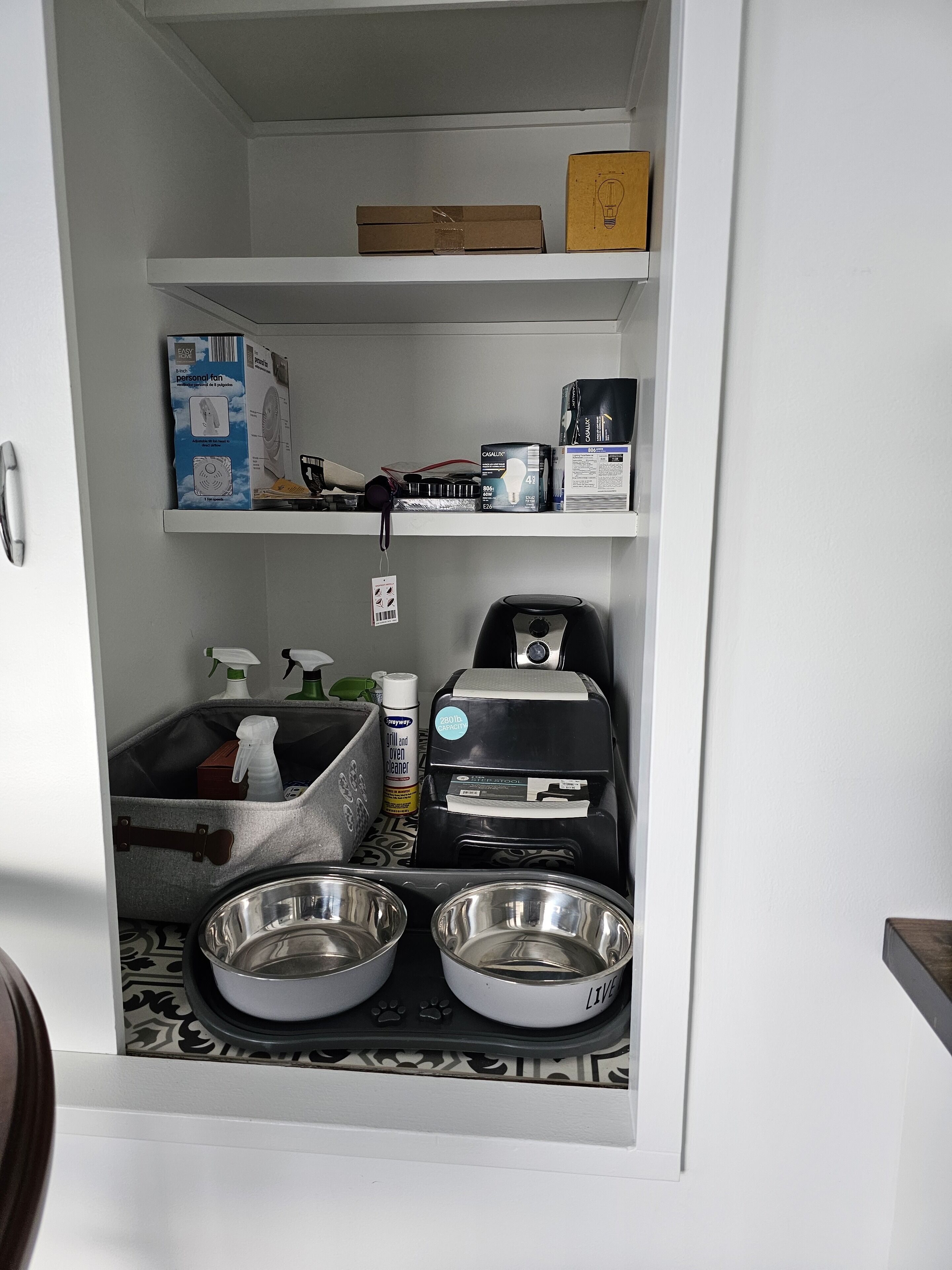 Pantry with air fryer,  fans, dog supplies, house supplies