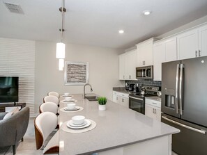 Fridge, microwave, dishwasher, coffee/tea maker