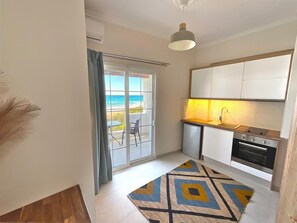 Apartemen, 1 kamar tidur, Boleh Merokok, balkon | Tempat makan