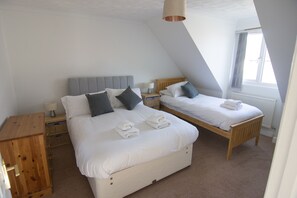 3 bedrooms, desk, iron/ironing board, travel cot