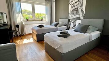 2 bedrooms, desk, iron/ironing board, travel crib