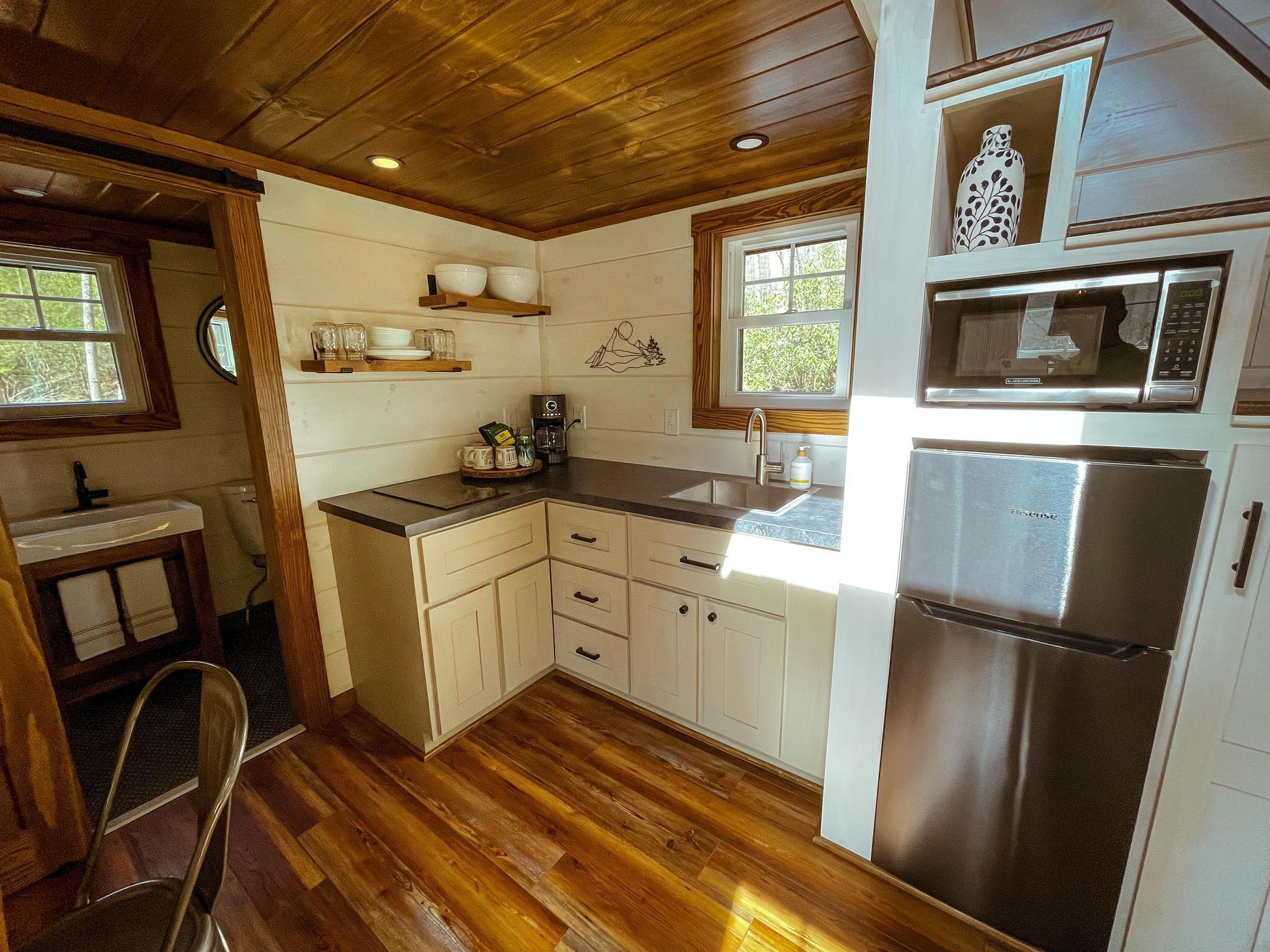 Dense foliage, rolling currents of Newberry Creek the perfect place to relax.