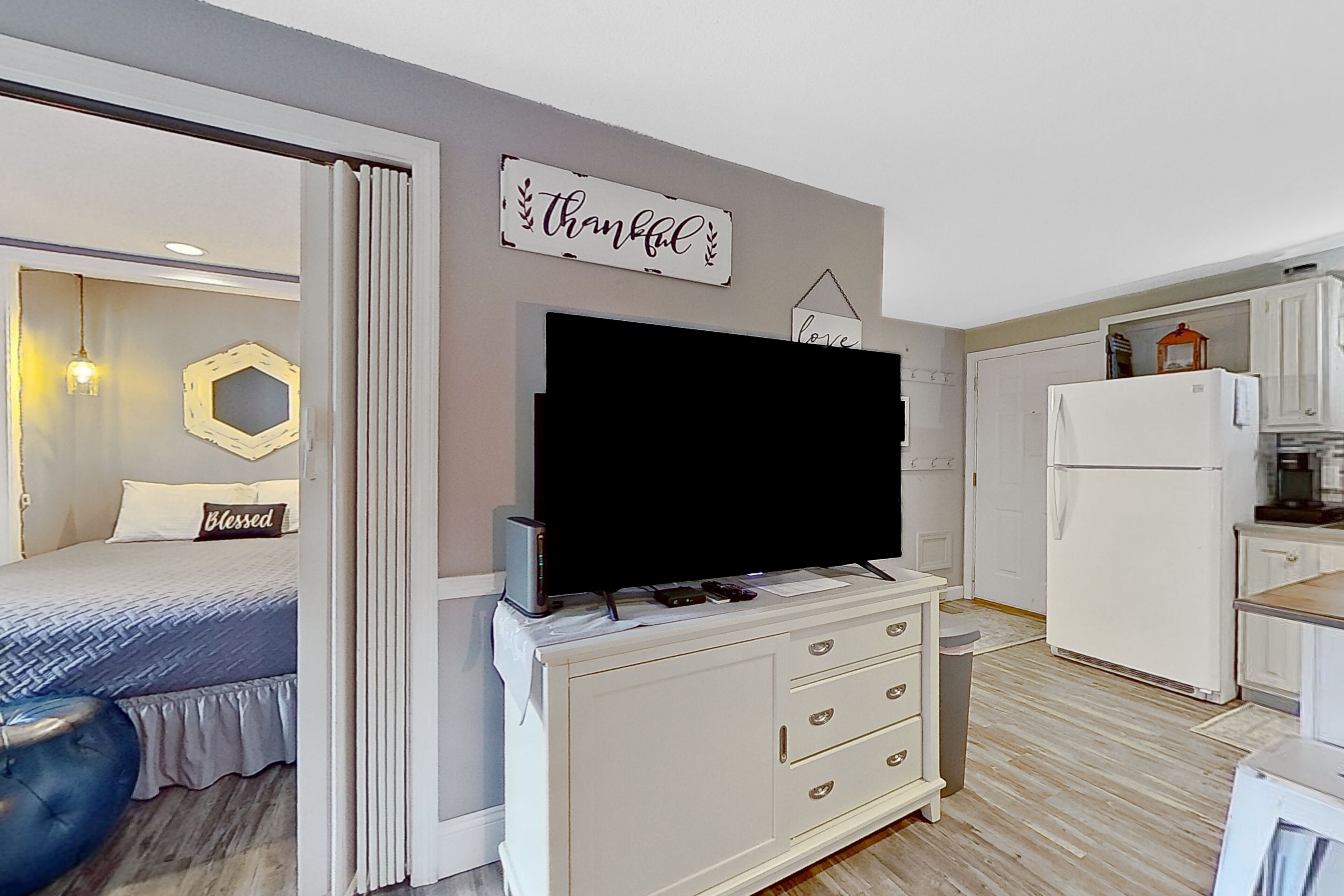 Lakeside condo with beach/water access, pool, hot tub, & sports courts