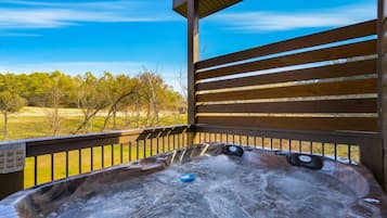 Cabin, Multiple Beds, Hot Tub | Outdoor spa tub