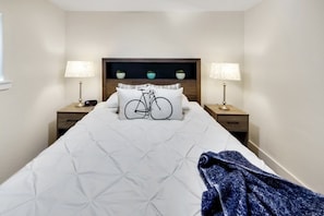 1 bedroom, desk, iron/ironing board, travel crib