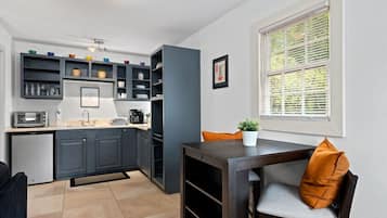 Fridge, stovetop, coffee/tea maker, cookware/dishes/utensils