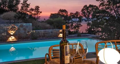 A fabulous brand new villa literally a splash away from the sea.