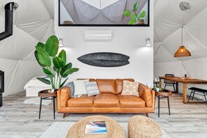 Luxury Glamping Dome 1, Lake and Forest View | Living area | Fireplace - Nalu Retreat & Nordic Spa (Porters Lake)