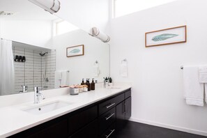 Shower, hair dryer, towels, soap - Stylish Urban Loft w/Floating Stairs and Fireplace (Seattle)