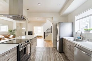 Fridge, microwave, oven, stovetop - Light-filled Modern Farmhouse near Cap Hill w/Yard (Seattle)