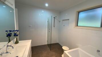 Shower, hair dryer, towels, soap