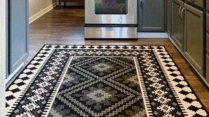 A kitchen with a microwave, oven, and cabinets. - Grand Rapids Dayton Station! (Grand Rapids)