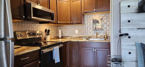 Studio condo with amazing water views, short walk to the beach