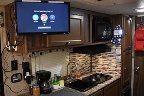 Fridge, microwave, stovetop, coffee/tea maker