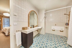 Accessible Guest Room | Bathroom | Shower, rainfall showerhead, designer toiletries, hair dryer