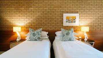 Premium bedding, down duvets, minibar, in-room safe