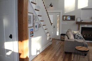 Smart TV, fireplace, books