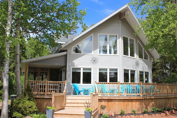 Beautiful A frame cottage with 1200 sq ft wrap around deck and screened in porch