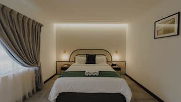 Premium bedding, blackout drapes, iron/ironing board, free WiFi