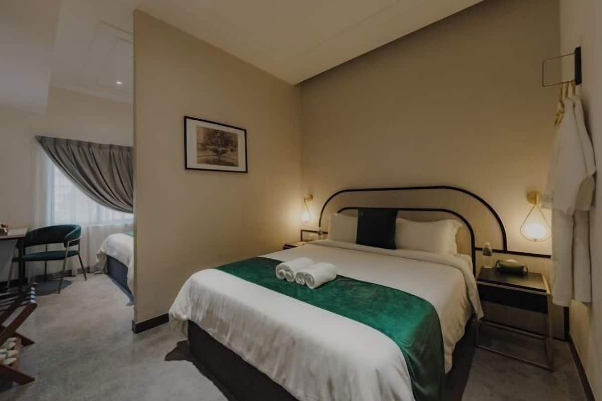 Premium bedding, blackout drapes, iron/ironing board, free WiFi