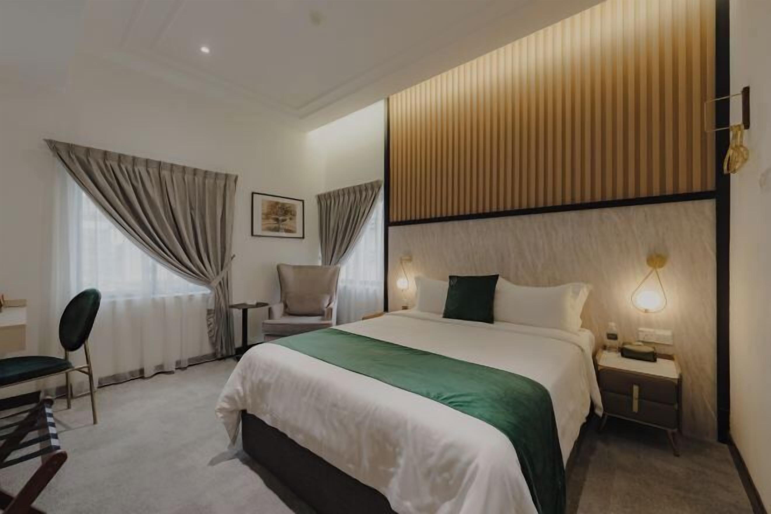 Premium bedding, blackout drapes, iron/ironing board, free WiFi