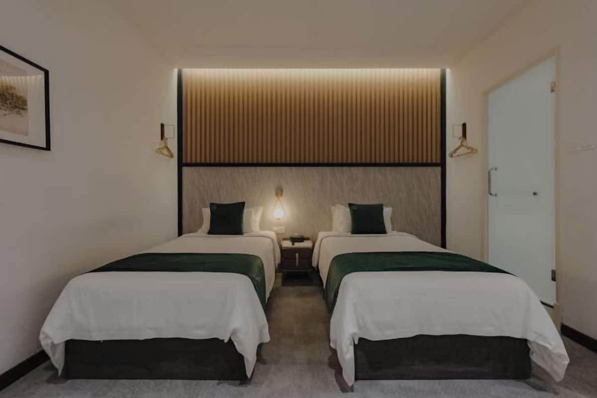 Premium bedding, blackout drapes, iron/ironing board, free WiFi