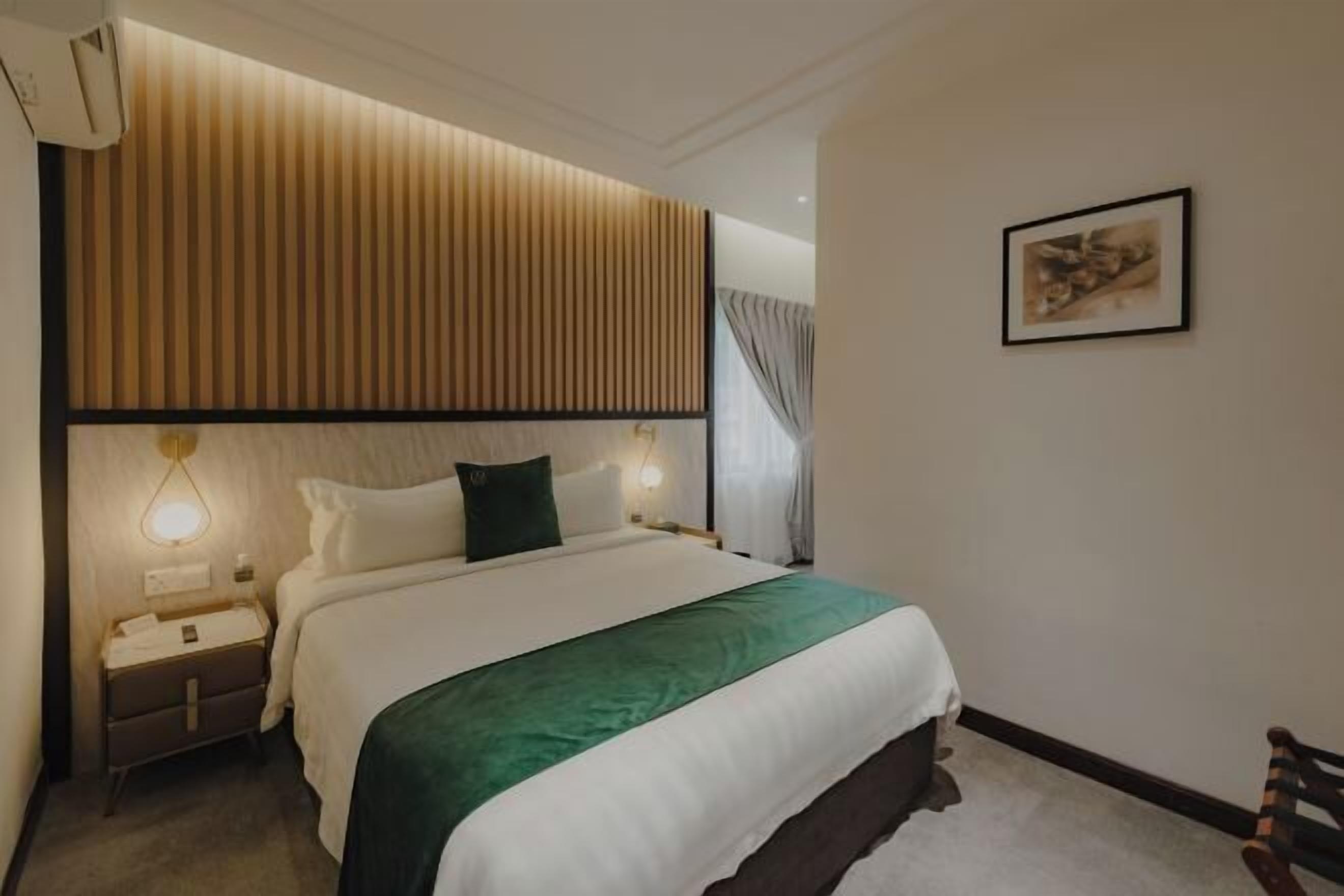 Premium bedding, blackout drapes, iron/ironing board, free WiFi