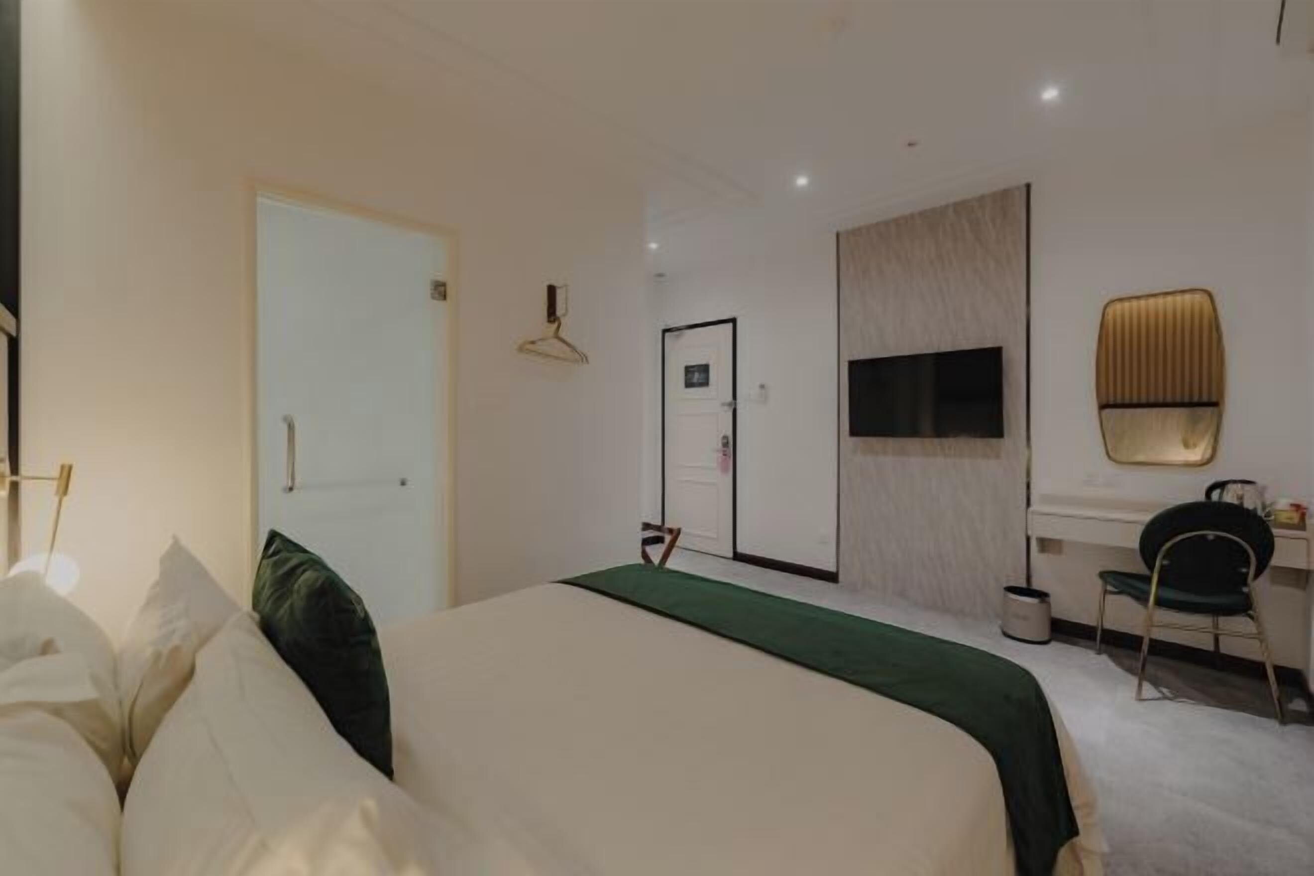 Premium bedding, blackout drapes, iron/ironing board, free WiFi