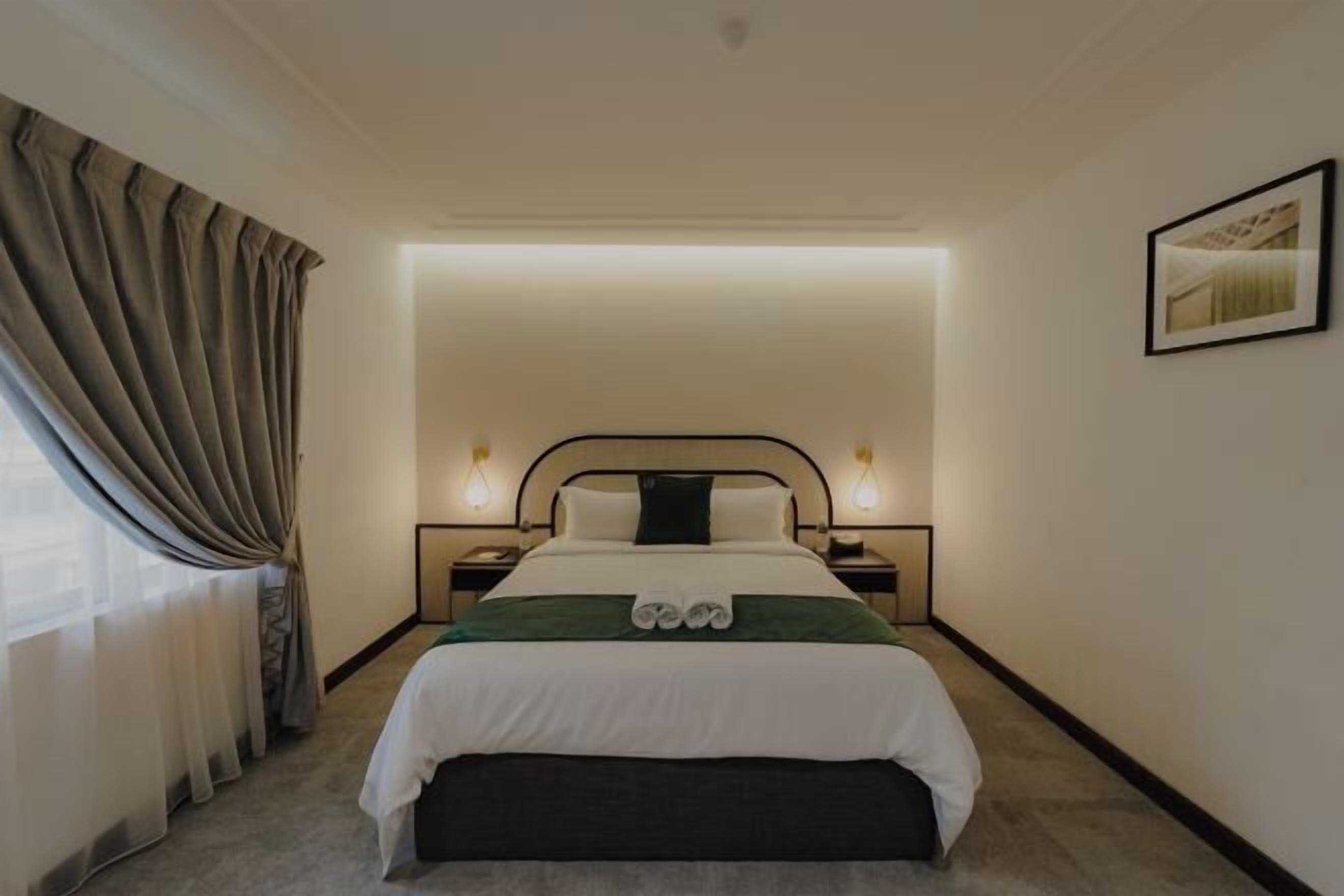 Premium bedding, blackout drapes, iron/ironing board, free WiFi