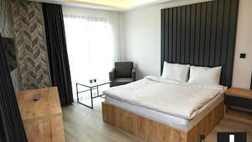 Chambre Double Deluxe | Literie de qualité supérieure, minibar, Wi-Fi gratuit, draps fournis