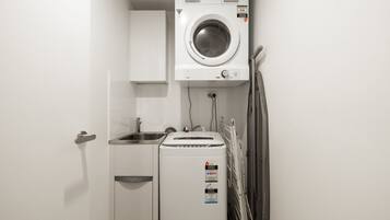 Family Apartment | Bathroom | Shower, hair dryer, towels, soap